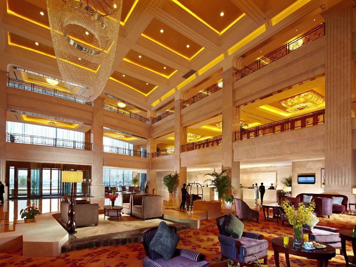 Jurong Yukun New Century Hotel Jiangsu Номер фото