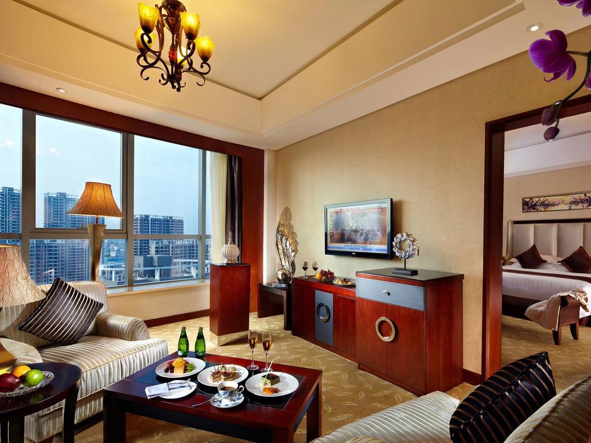Jurong Yukun New Century Hotel Jiangsu Номер фото